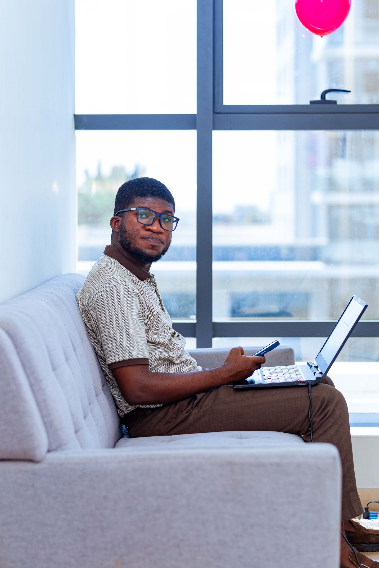 Tenant working on a laptop in an apartment